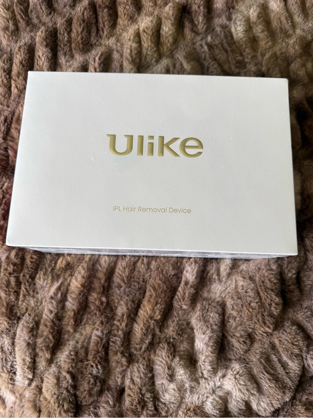 Ulike IPL Hair Removal Device - White with Gold Logo